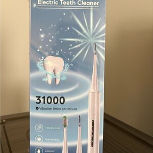 Electric Teeth Cleaner - White